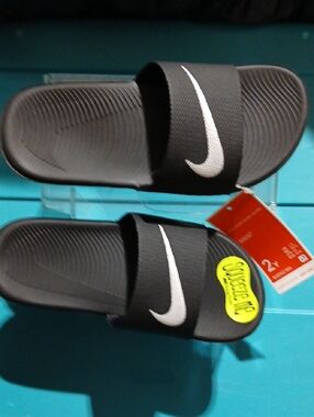 Nike Black Slides with White Swoosh